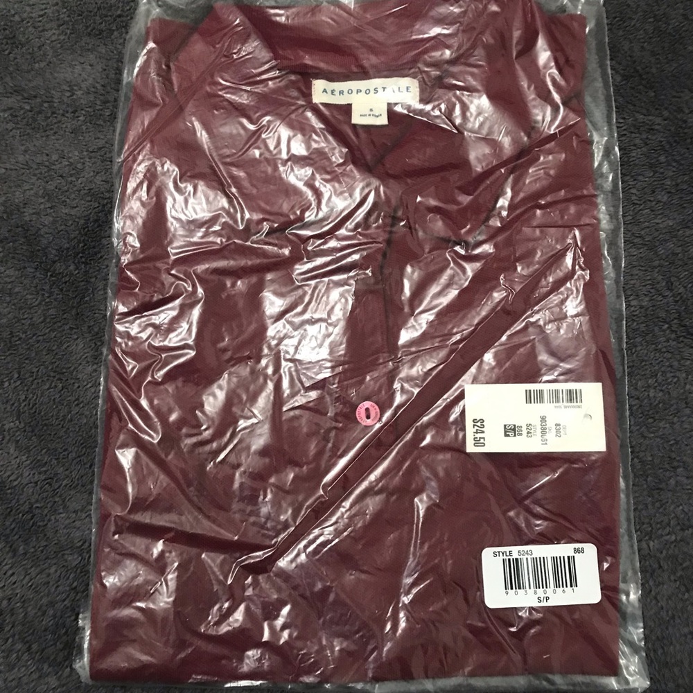Cranberry new polo size small.